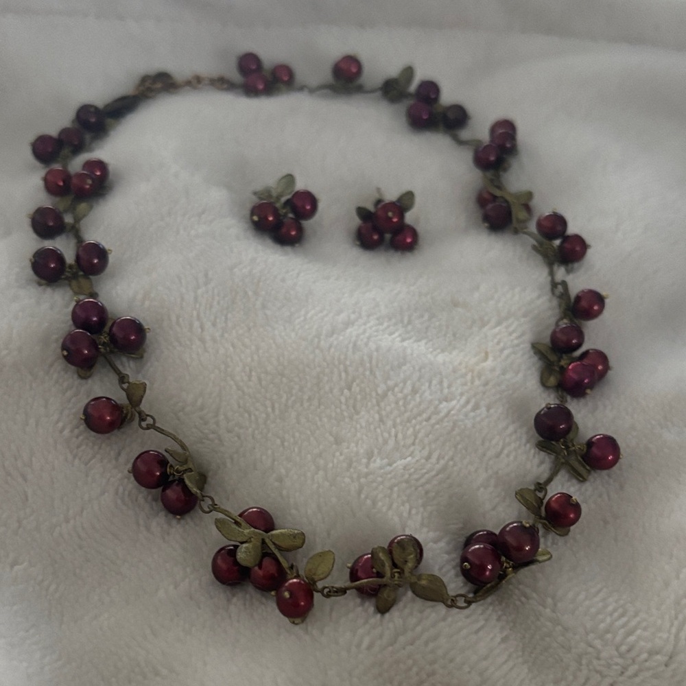 Beautiful handcrafted cranberry necklace and earrings.
